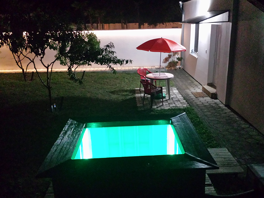 Wood-fired hot tub at night in Subotica, Serbia