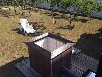 Private outdoor wood-fired hot tub experience in Subotica