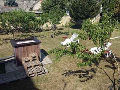 Private outdoor wood-fired hot tub in Subotica